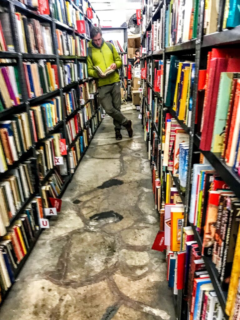 Engrossed in the shelves of The Strand Bookstore, NYC 2019