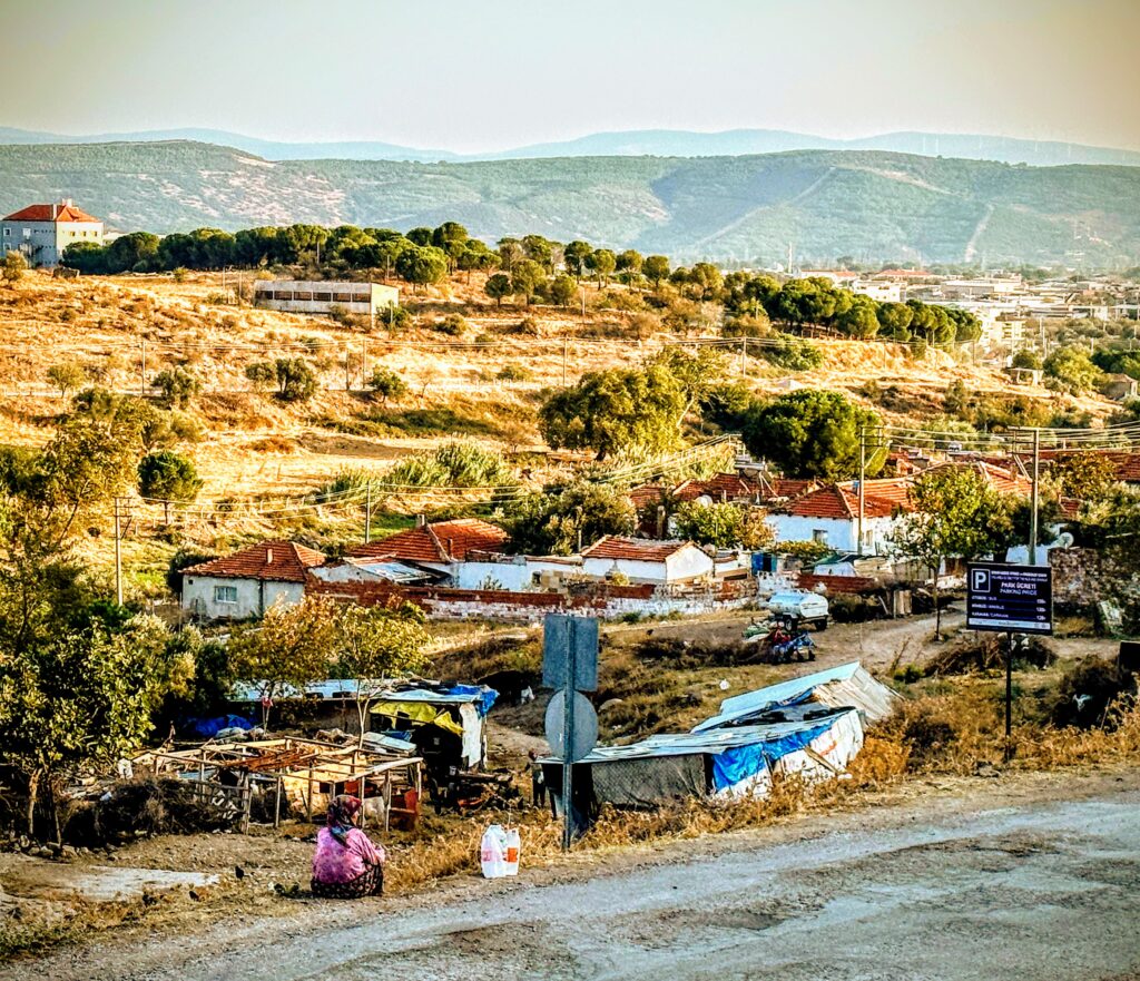 A woman looks over her village of Bergama, Turkiye 2023